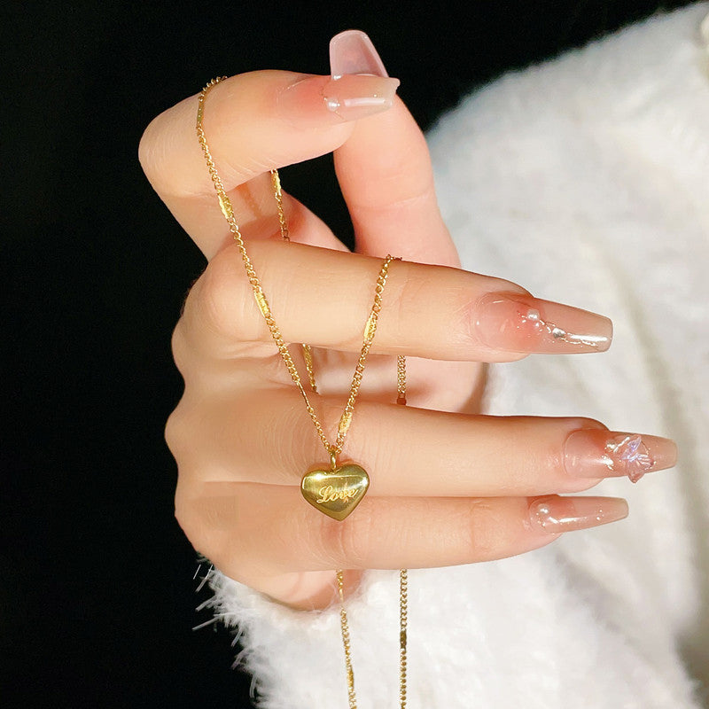 Jewels Galaxy Gold Plated Stainless Steel Anti Tarnish Heart Themed Pendant For Women