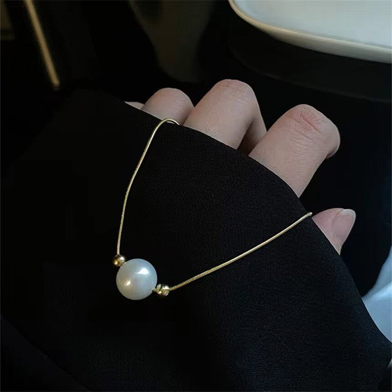 Jewels Galaxy Gold Plated Stainless Steel Anti Tarnish Pearl Pendant