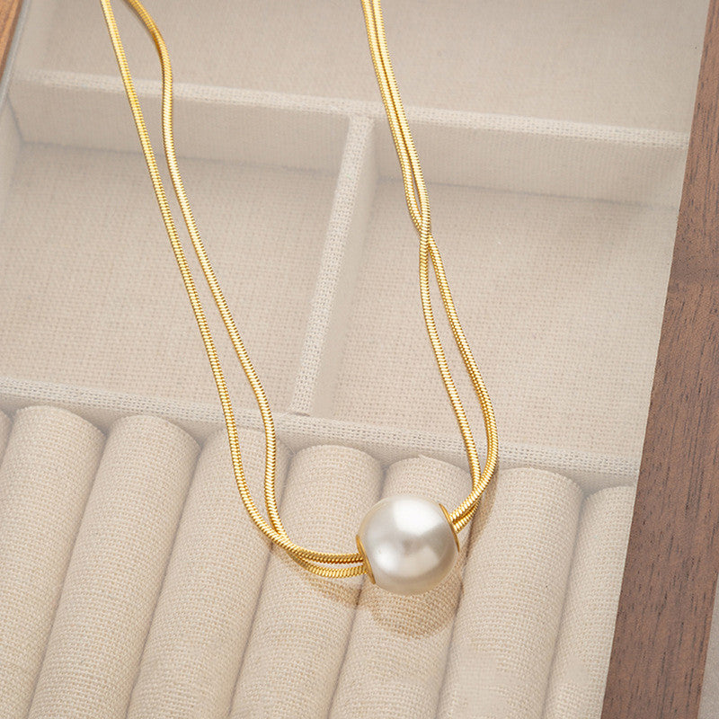 Jewels Galaxy Gold Plated Stainless Steel Anti Tarnish Pearl Studded Pendant