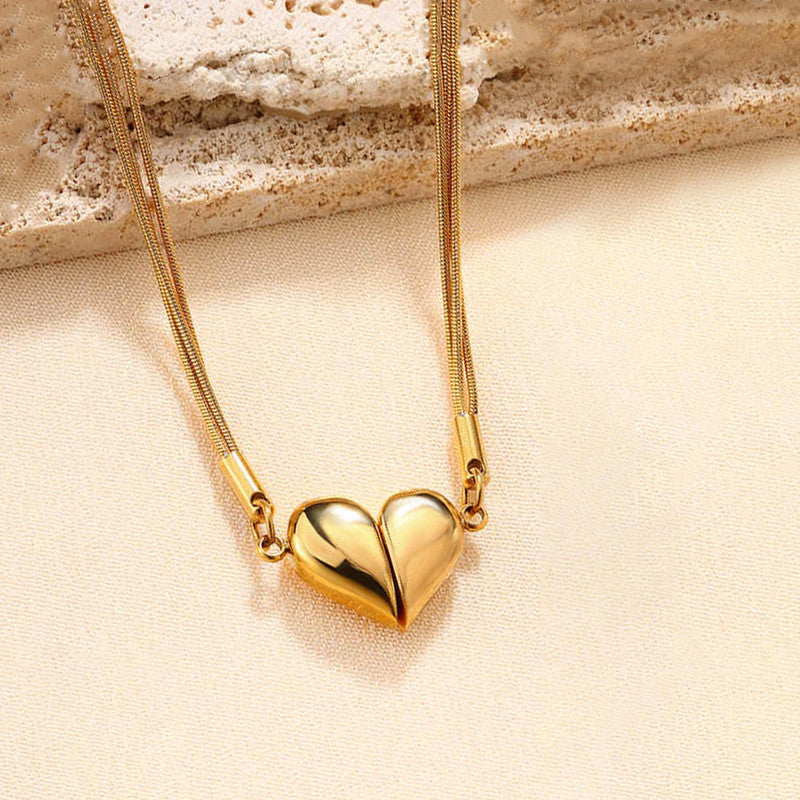 Jewels Galaxy Gold Plated Anti Tarnish Stainless Steel Heart themed Separable Magnet Pendant