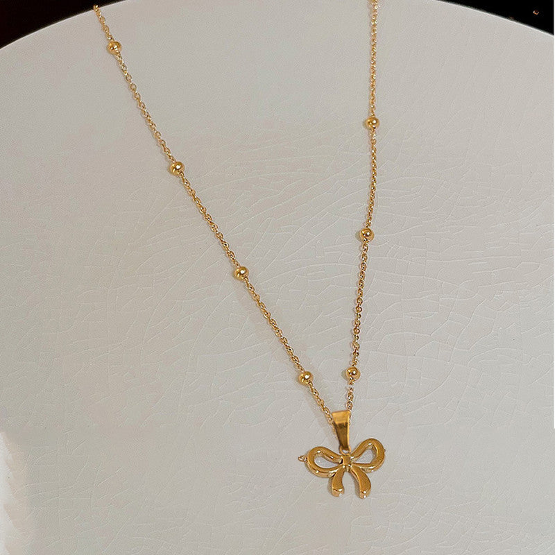 Jewels Galaxy Gold-Plated Anti Tarnish Stainless Steel Infinity Bow Pendant