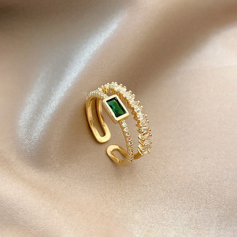 Jewels Galaxy Gold Plated Stainless Steel Anti Tarnish Green Emerald Studded Adjustable Finger Ring