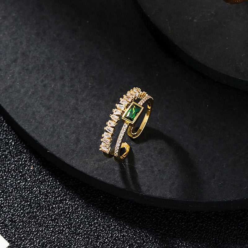 Jewels Galaxy Gold Plated Stainless Steel Anti Tarnish Green Emerald Studded Adjustable Finger Ring