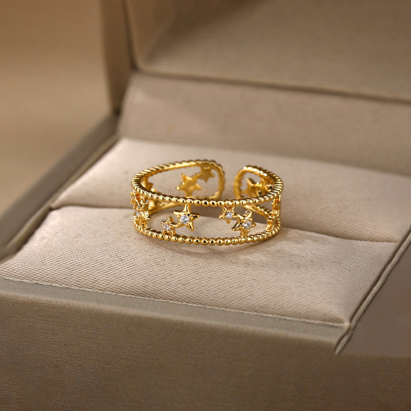 Jewels Galaxy Gold Plated Anti Tarnish Stainless Steel Star Themed Adjustable Finger Ring