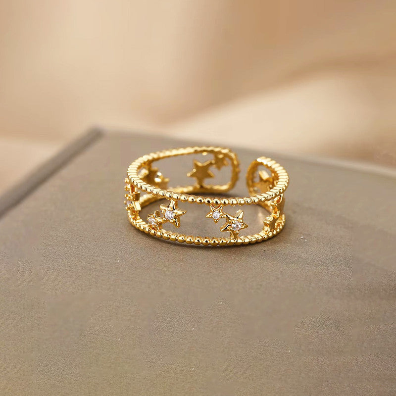 Jewels Galaxy Gold Plated Anti Tarnish Stainless Steel Star Themed Adjustable Finger Ring