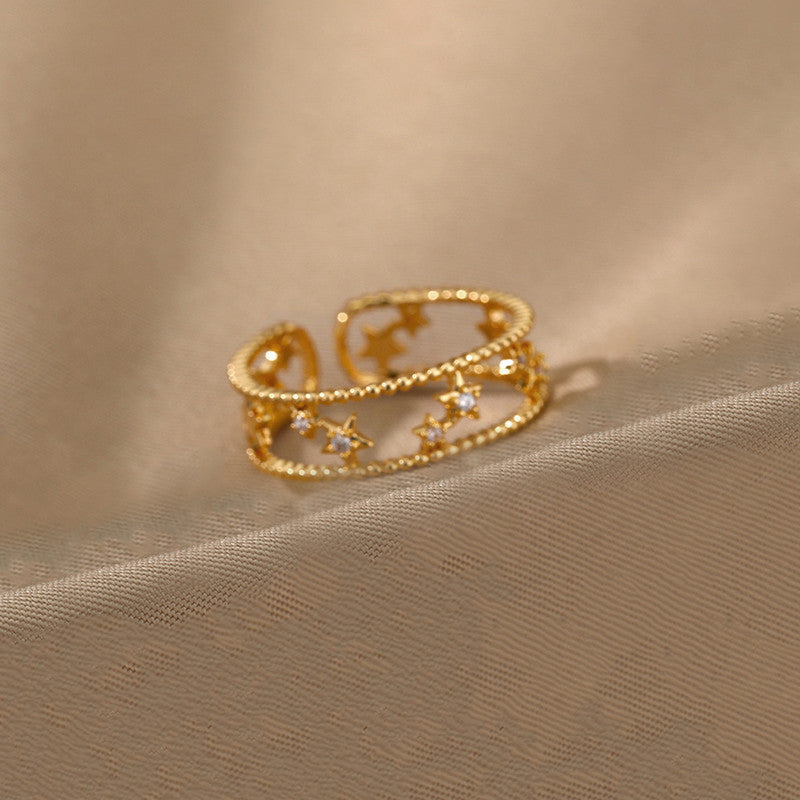 Jewels Galaxy Gold Plated Anti Tarnish Stainless Steel Star Themed Adjustable Finger Ring