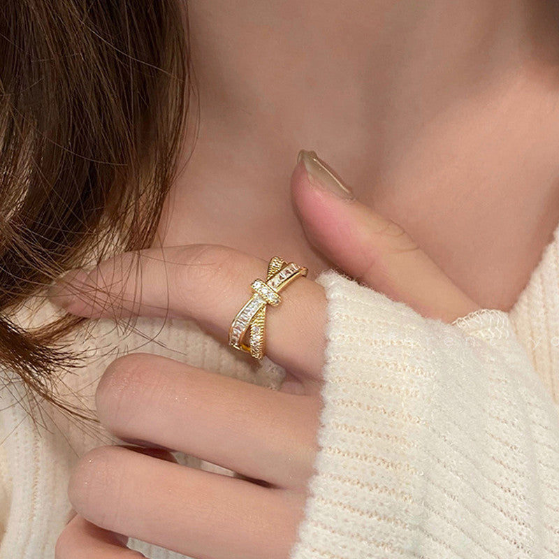 Jewels Galaxy Gold Plated Anti Tarnish Stainless Steel Cross Shaped Adjustable Finger Ring