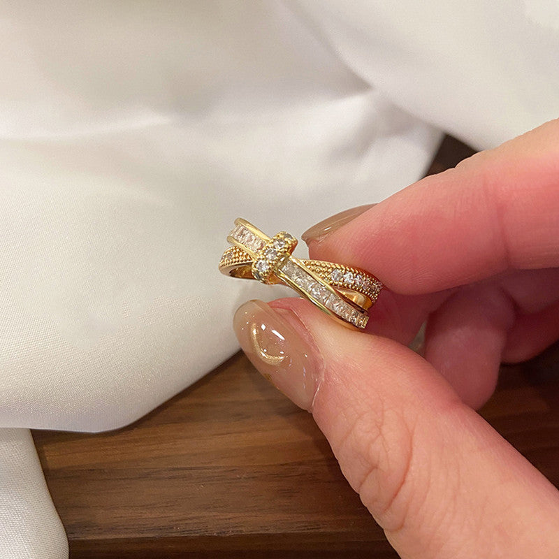 Jewels Galaxy Gold Plated Anti Tarnish Stainless Steel Cross Shaped Adjustable Finger Ring