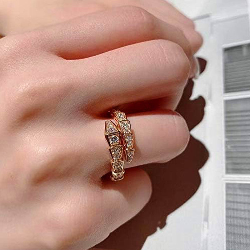 Jewels Galaxy Gold Plated Anti Tarnish Stainless Steel Snake Themed Adjustable Finger Ring