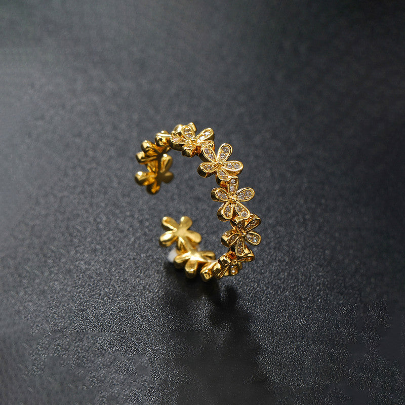Jewels Galaxy Gold Plated Anti Tarnish Stainless Steel Floral Themed Adjustable Finger Ring