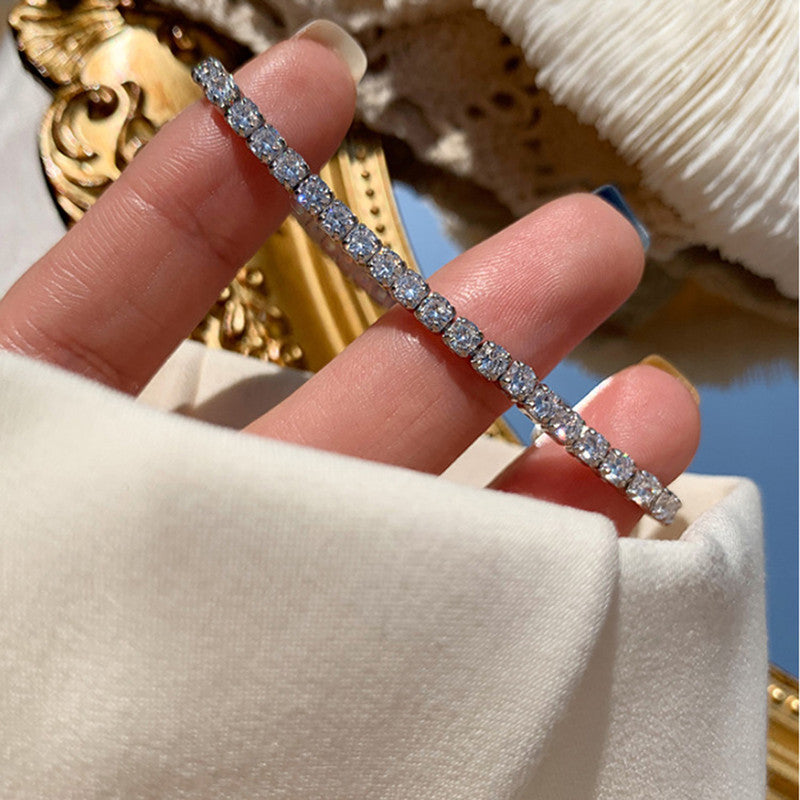 Jewels Galaxy Silver Plated Round Cut Cubic Zirconia White Matrix Anti Tarnish Tennis Bracelet