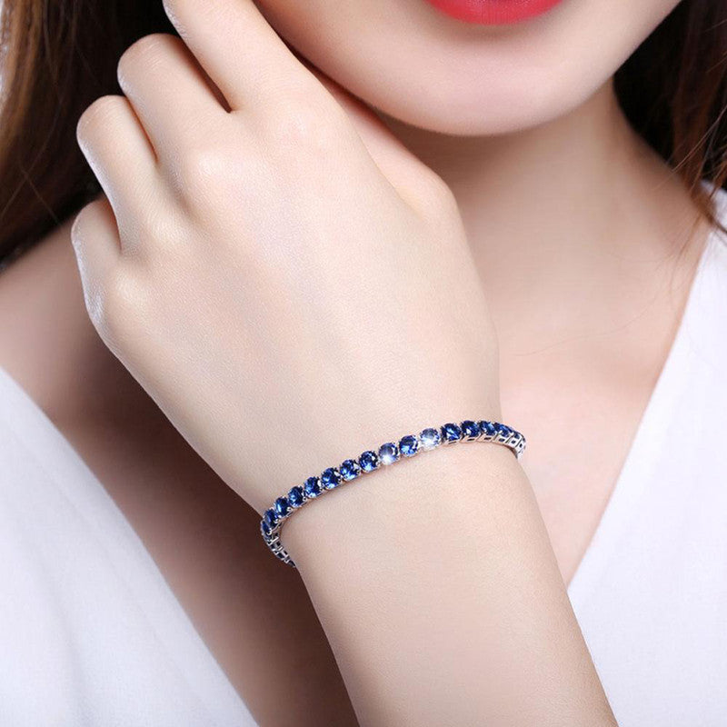 Jewels Galaxy Silver Plated Round Cut Cubic Zirconia Blue Matrix Anti Tarnish Tennis Bracelet