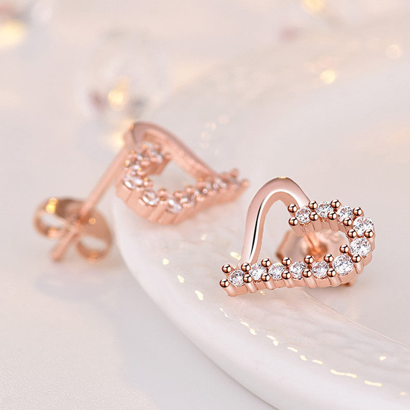 Jewels Galaxy Rose Gold Plated American Diamond Studded Heart Shape Korean Stud Earrings