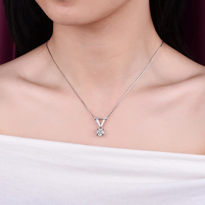 Jewels Galaxy Silver Plated Crystal Studded V Shape Circular Solitaire Pendant