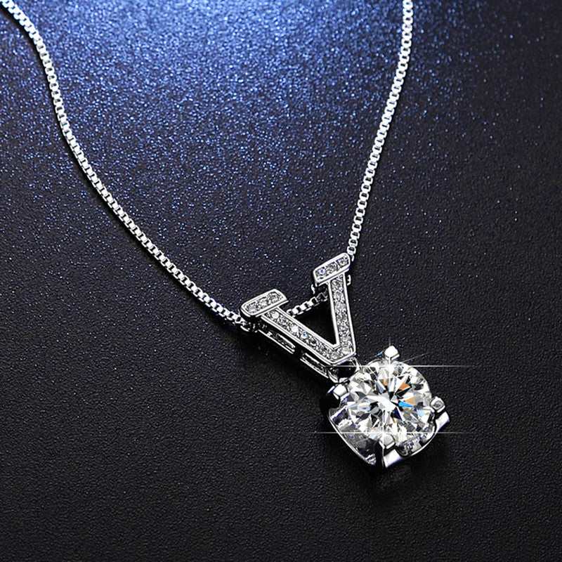 Jewels Galaxy Silver Plated Crystal Studded V Shape Circular Solitaire Pendant