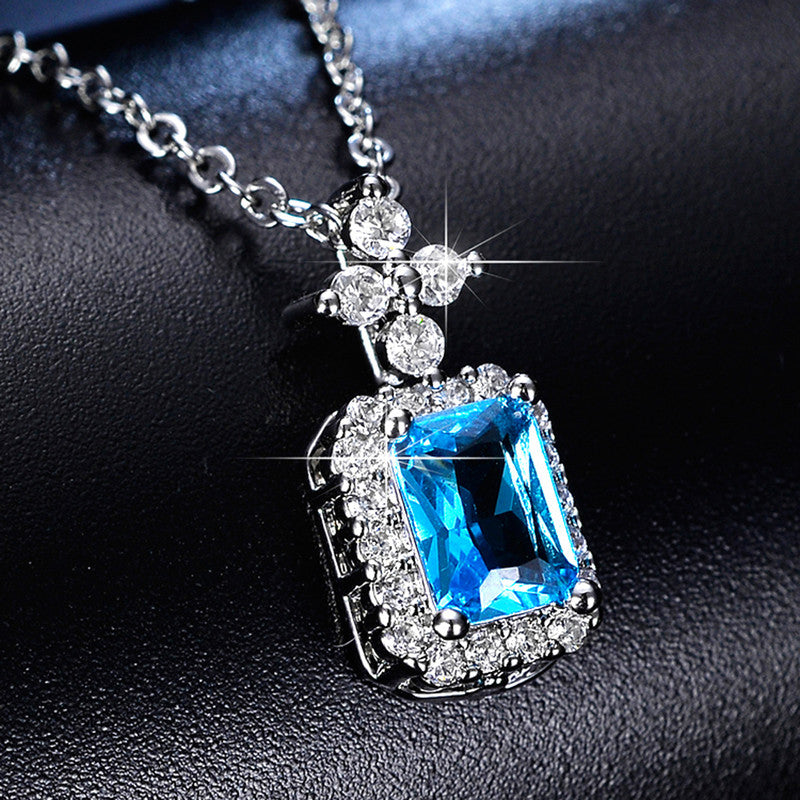 Jewels Galaxy Silver Plated Crystal Studded Geometrical Blue Stone Anti Tarnish Solitaire Pendant