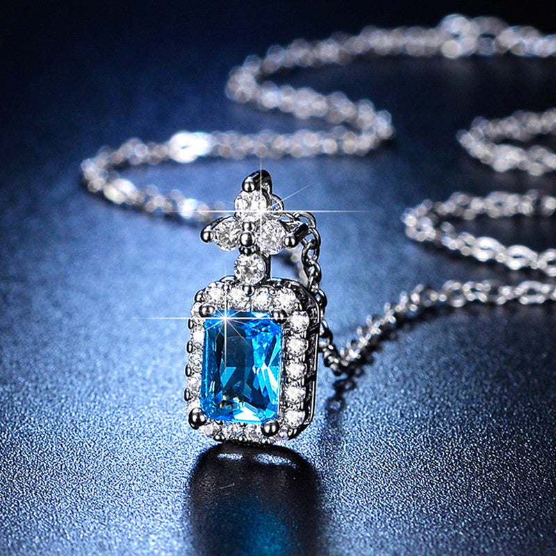 Jewels Galaxy Silver Plated Crystal Studded Geometrical Blue Stone Anti Tarnish Solitaire Pendant