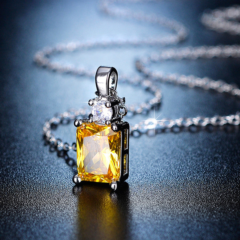 Jewels Galaxy Silver Plated Crystal Studded Geometrical Yellow Stone Anti Tarnish Solitaire Pendant