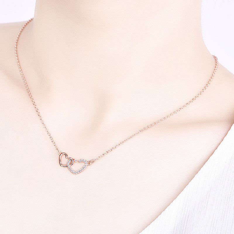 Jewels Galaxy Rose Gold Plated American Diamond Studded Dual Heart Contemporary Korean Pendant