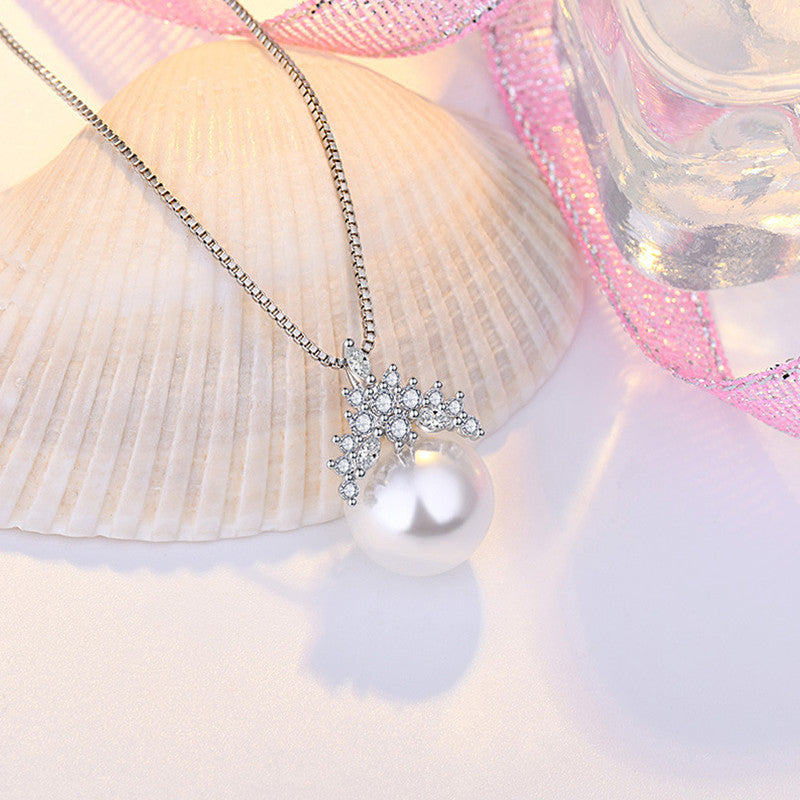 Jewels Galaxy Silver Plated American Diamond Studded Crown Like Pearl Studded Korean Pendant