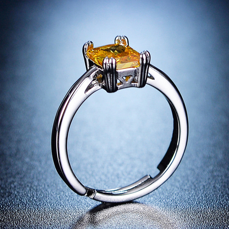 Jewels Galaxy Silver Plated Crystal Studded Rectangular Yellow Stone Anti Tarnish Adjustable Ring