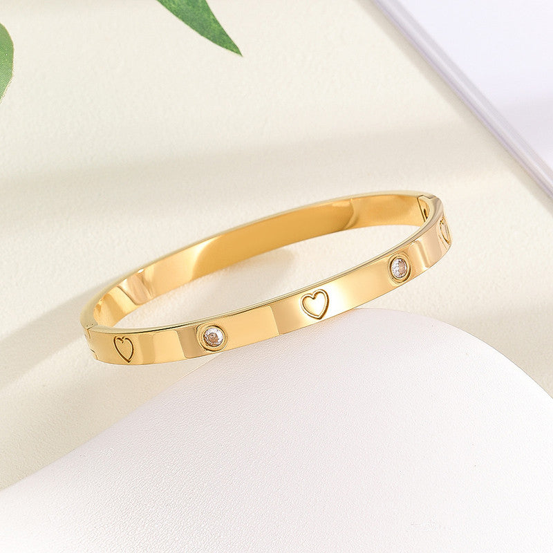 Jewels Galaxy Stainless Steel Astonishing Gold Plated Love AD Anti-Tarnish Bracelet For Women
