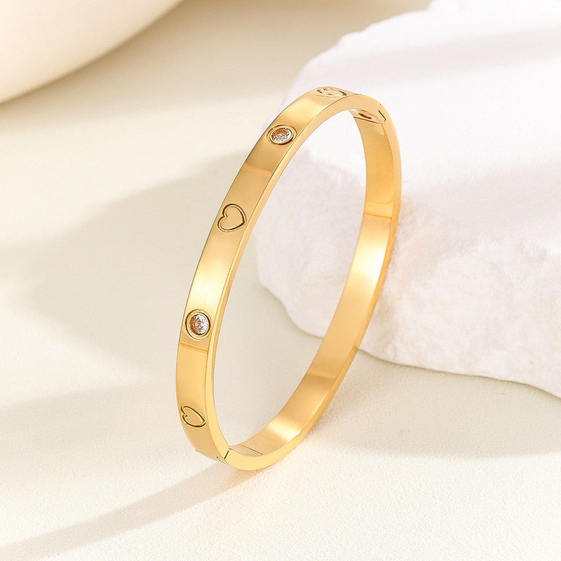 Jewels Galaxy Stainless Steel Astonishing Gold Plated Love AD Anti-Tarnish Bracelet For Women