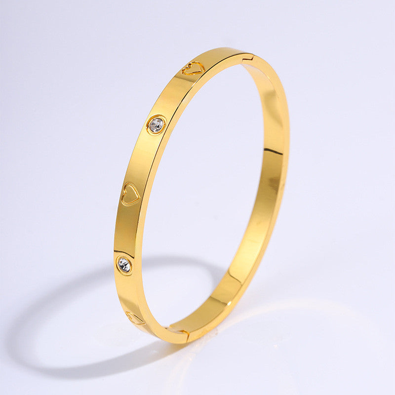 Jewels Galaxy Stainless Steel Astonishing Gold Plated Love AD Anti-Tarnish Bracelet For Women