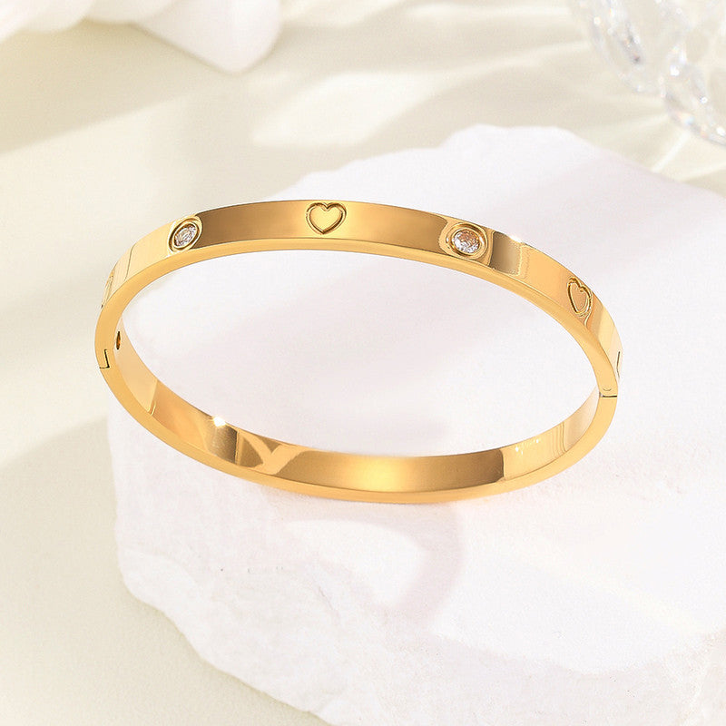 Jewels Galaxy Stainless Steel Astonishing Gold Plated Love AD Anti-Tarnish Bracelet For Women