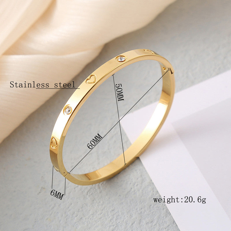 Jewels Galaxy Stainless Steel Astonishing Gold Plated Love AD Anti-Tarnish Bracelet For Women