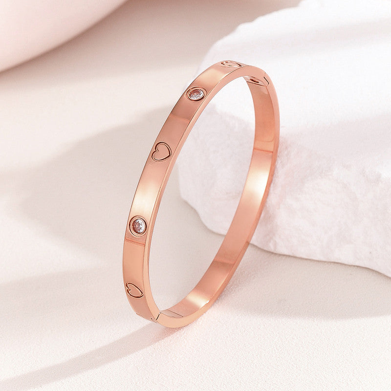 Jewels Galaxy Stainless Steel Astonishing Rose Gold Plated Love AD Bracelet For Women