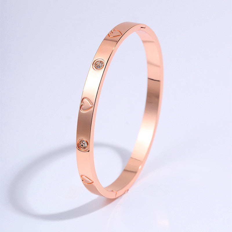 Jewels Galaxy Stainless Steel Astonishing Rose Gold Plated Love AD Bracelet For Women