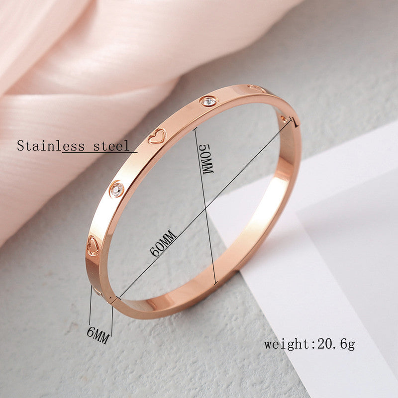 Jewels Galaxy Stainless Steel Astonishing Rose Gold Plated Love AD Bracelet For Women