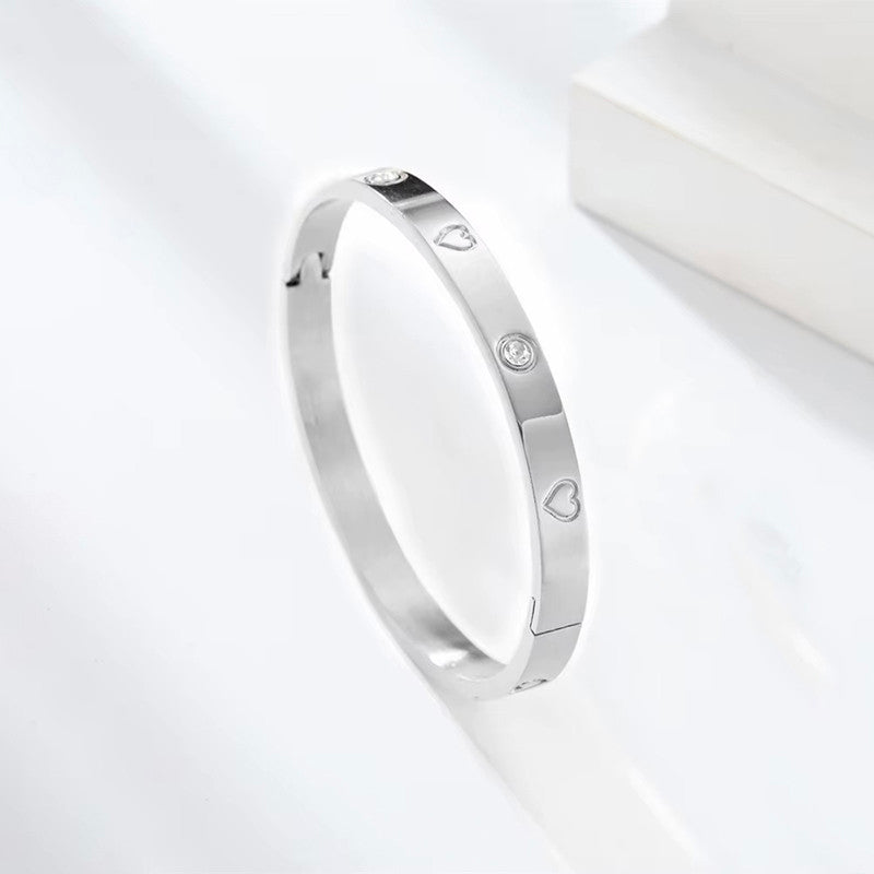 Jewels Galaxy Stainless Steel Astonishing Silver Plated Love AD Anti-Tarnish Bracelet For Women