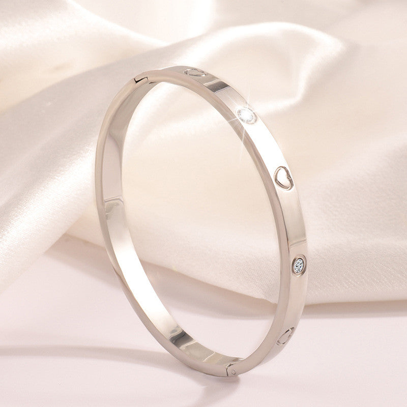 Jewels Galaxy Stainless Steel Astonishing Silver Plated Love AD Anti-Tarnish Bracelet For Women