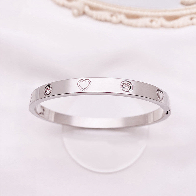 Jewels Galaxy Stainless Steel Astonishing Silver Plated Love AD Anti-Tarnish Bracelet For Women