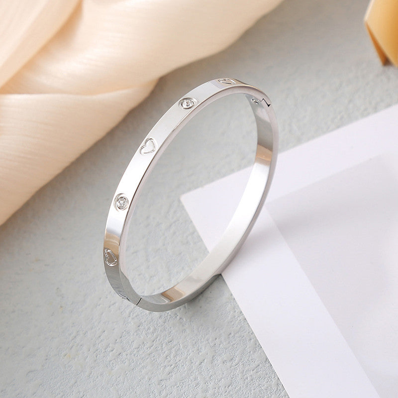 Jewels Galaxy Stainless Steel Astonishing Silver Plated Love AD Anti-Tarnish Bracelet For Women