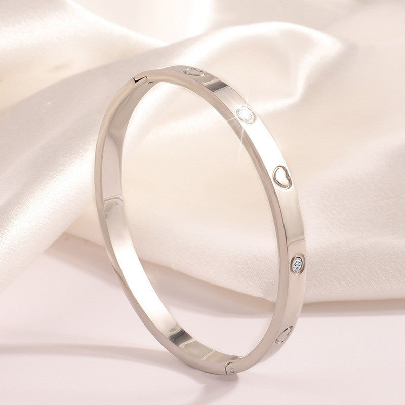Jewels Galaxy Stainless Steel Astonishing Silver Plated Love AD Anti-Tarnish Bracelet For Women