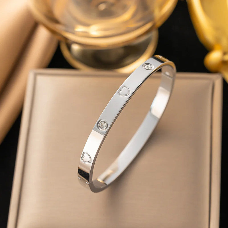 Jewels Galaxy Stainless Steel Astonishing Silver Plated Love AD Anti-Tarnish Bracelet For Women