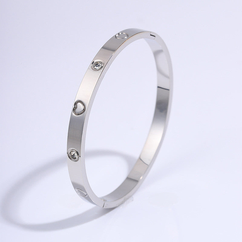 Jewels Galaxy Stainless Steel Astonishing Silver Plated Love AD Anti-Tarnish Bracelet For Women