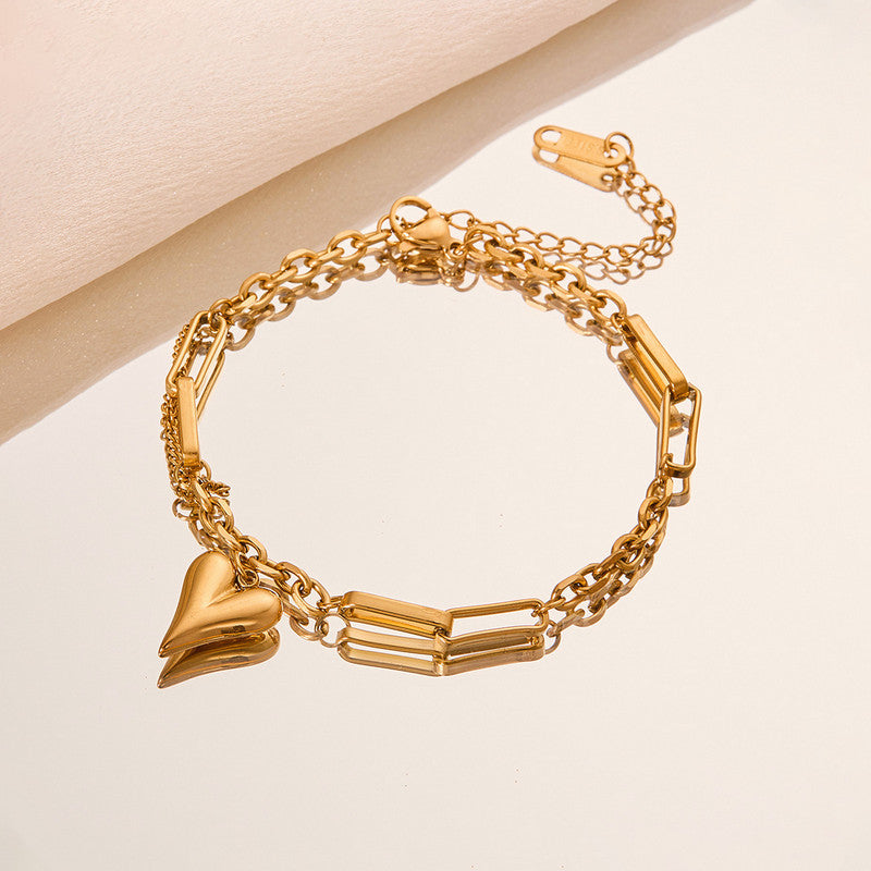 Jewels Galaxy Gold-Plated Anti Tarnish Heart Themed Charm Bracelet