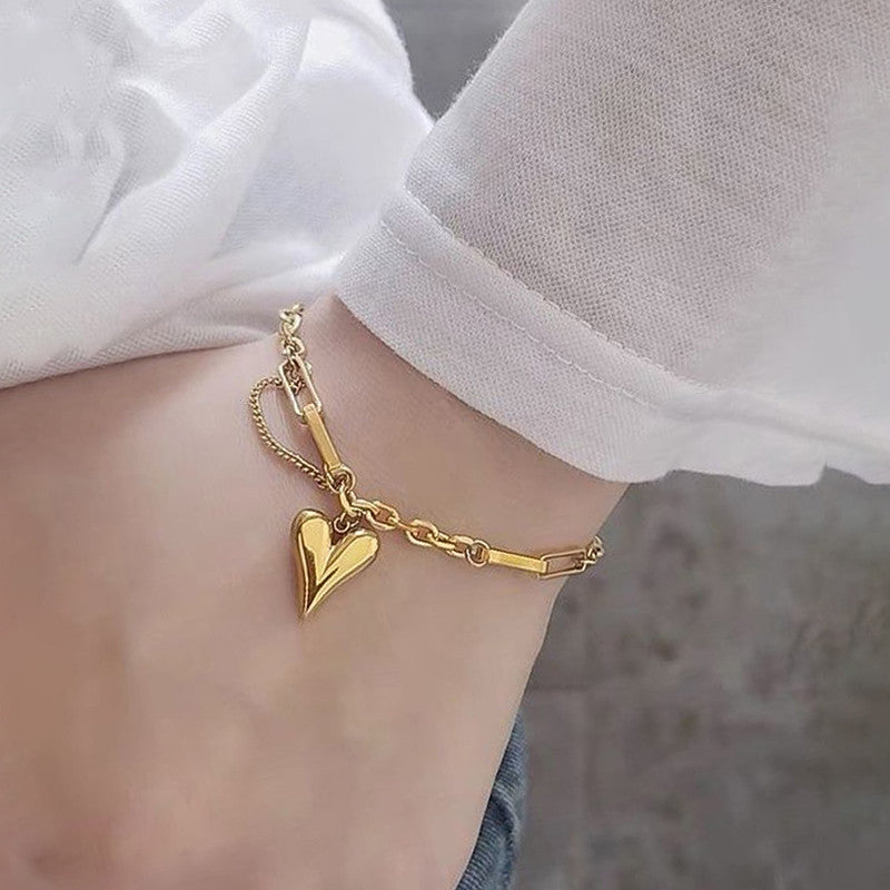 Jewels Galaxy Gold-Plated Anti Tarnish Heart Themed Charm Bracelet