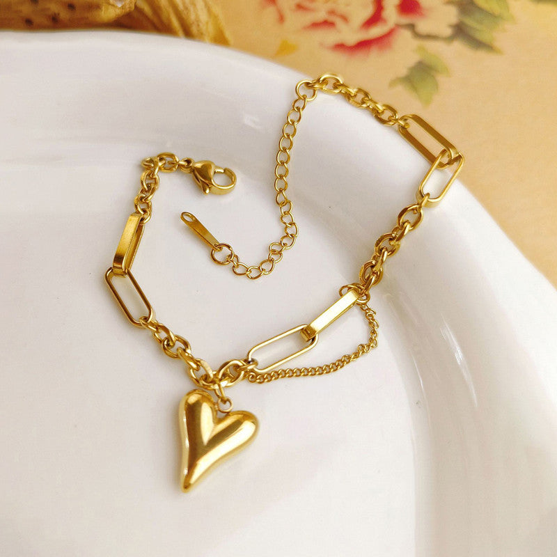 Jewels Galaxy Gold-Plated Anti Tarnish Heart Themed Charm Bracelet
