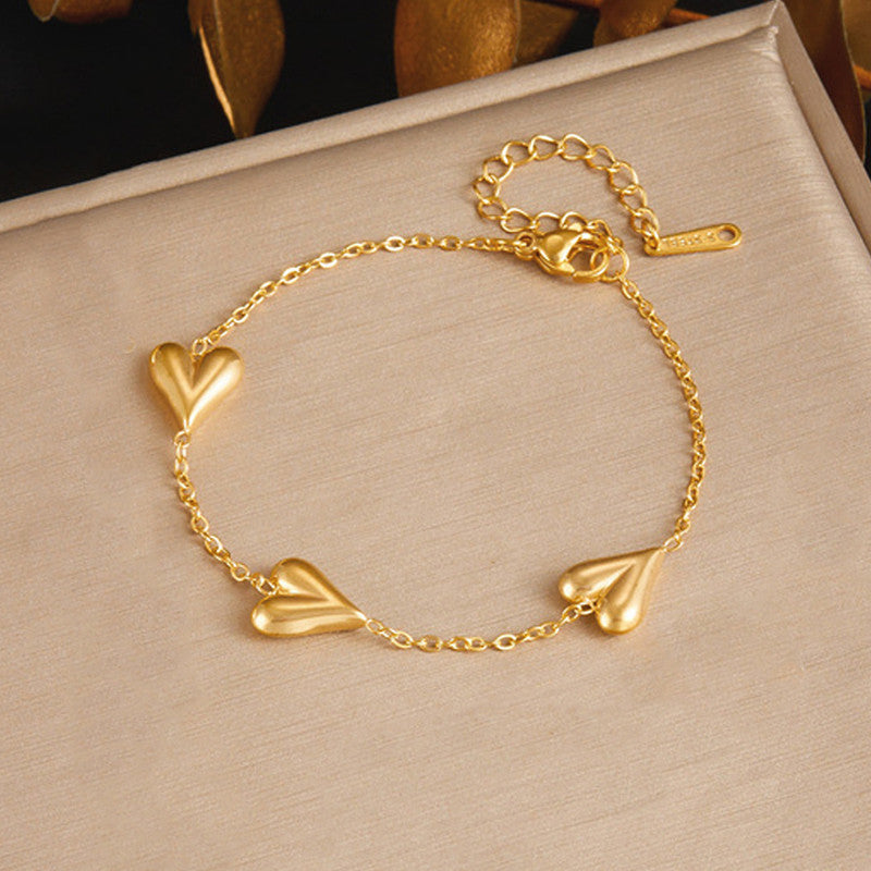 Jewels Galaxy Gold-Plated Anti Tarnish Heart Themed Bracelet