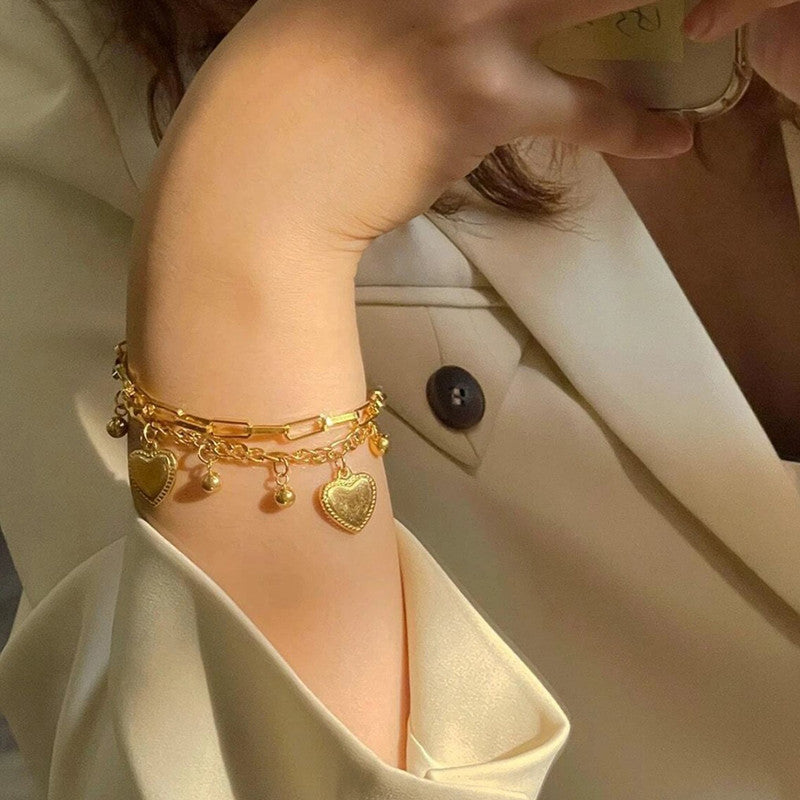 Jewels Galaxy Gold Plated Stainless Steel Anti Tarnish Heart themed Wraparound Bracelet For Women