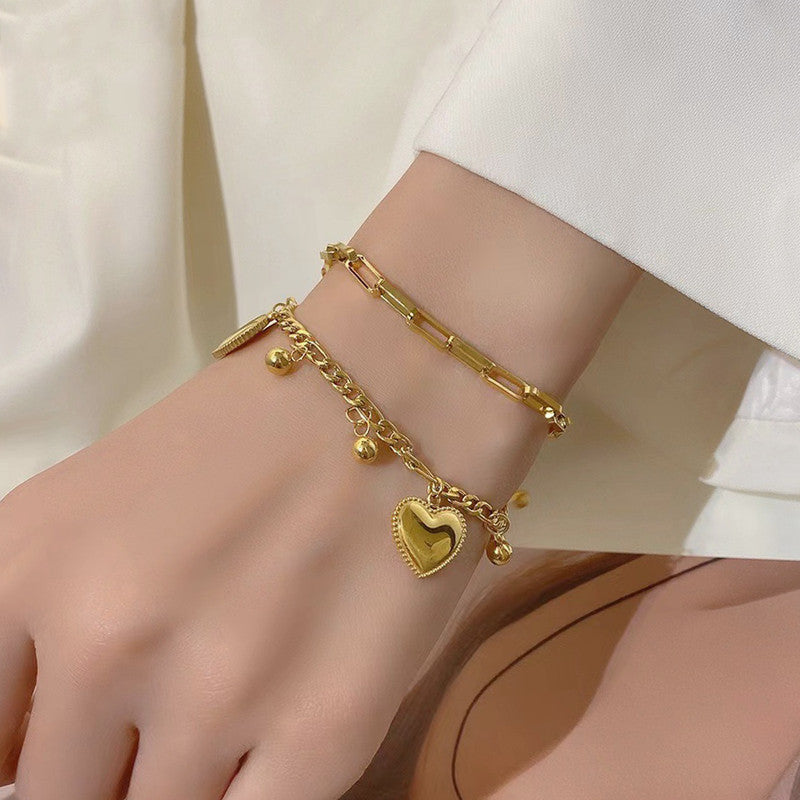 Jewels Galaxy Gold Plated Stainless Steel Anti Tarnish Heart themed Wraparound Bracelet For Women