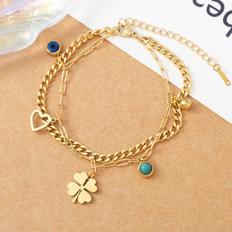 Jewels Galaxy Gold Plated Stainless Steel Anti Tarnish Clover themed Evil Eye Wraparound Bracelet