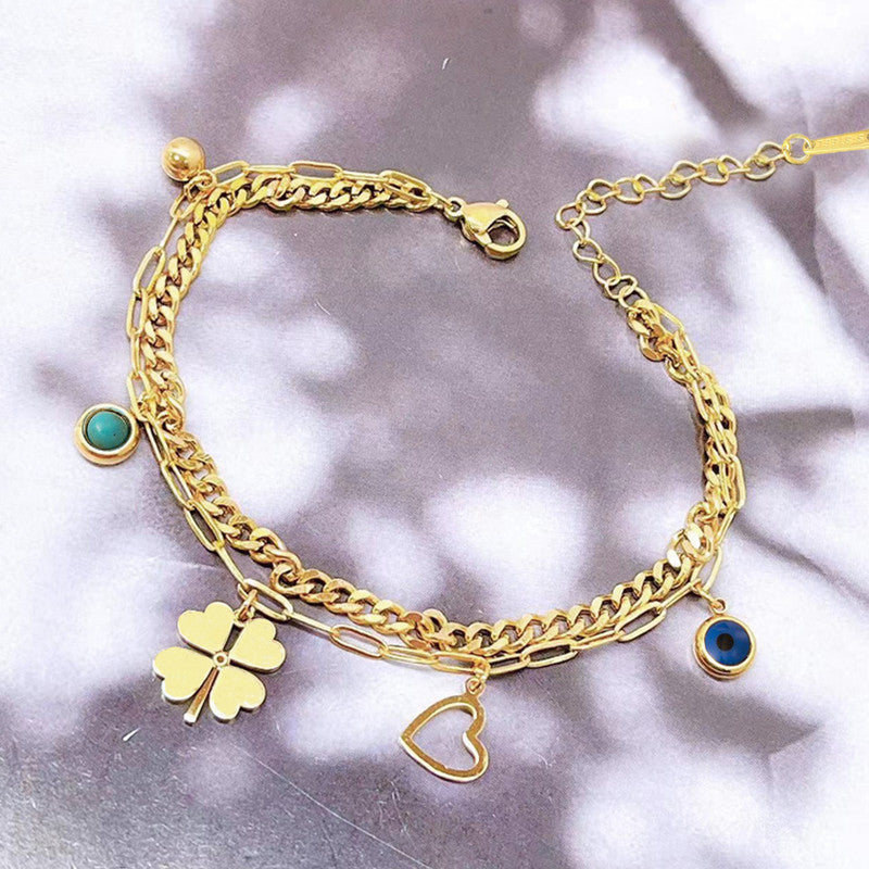 Jewels Galaxy Gold Plated Stainless Steel Anti Tarnish Clover themed Evil Eye Wraparound Bracelet