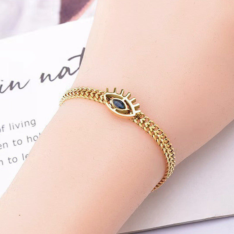 Jewels Galaxy Gold Plated Stainless Steel Anti Tarnish Evil Eye themed Wraparound Bracelet