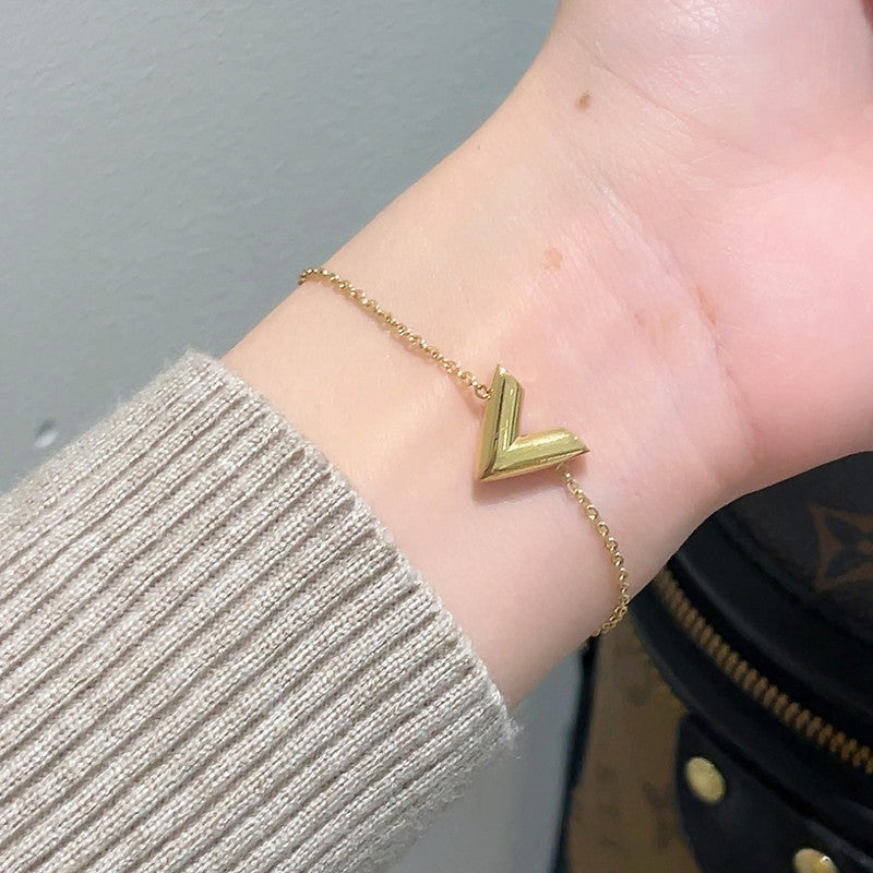 Jewels Galaxy Gold Plated Stainless Steel Anti Tarnish V-Shaped Wraparound Bracelet For Women